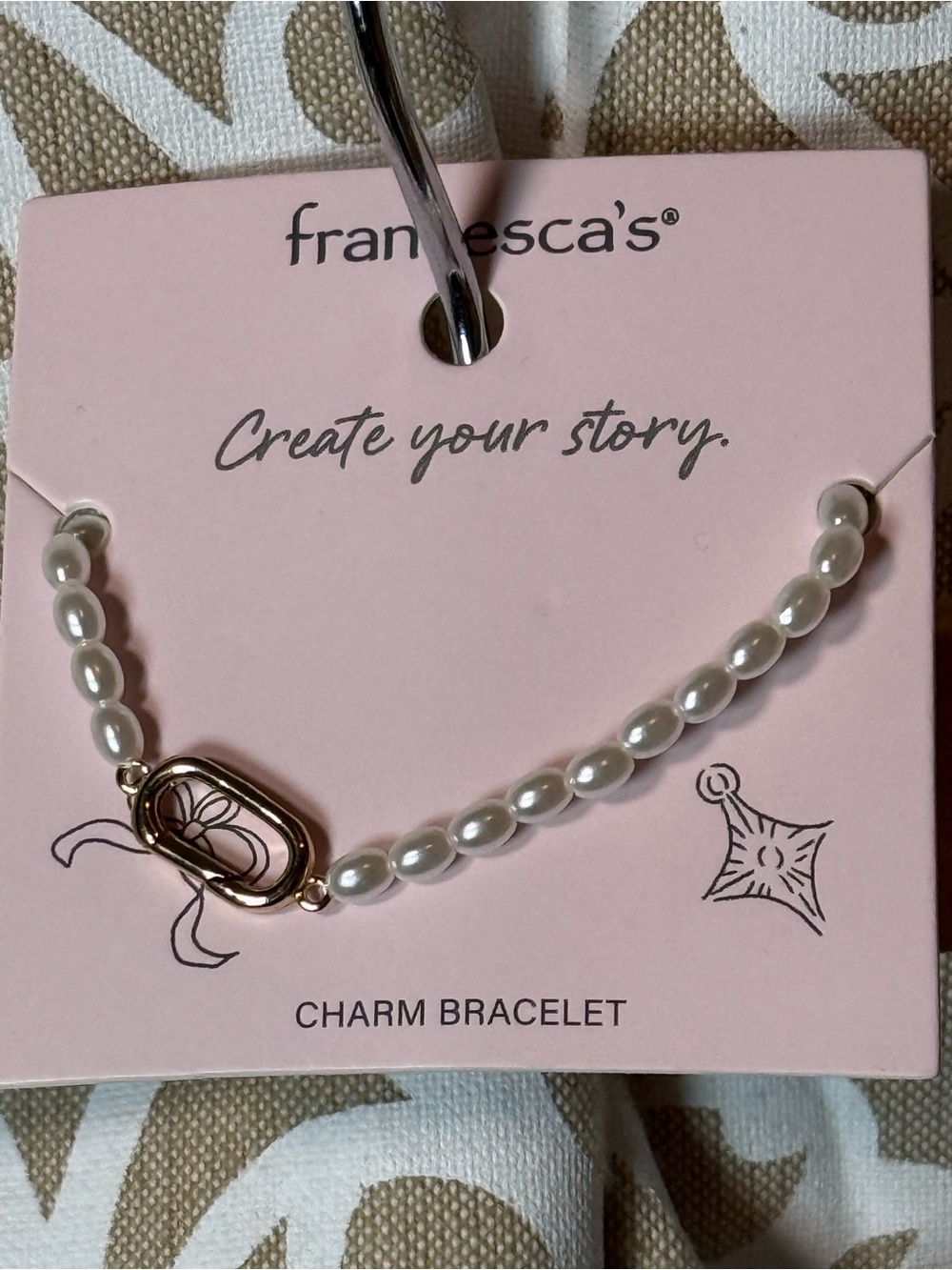 Francesca's Collections White Pearl Bracelet with Gold Toggle Charm